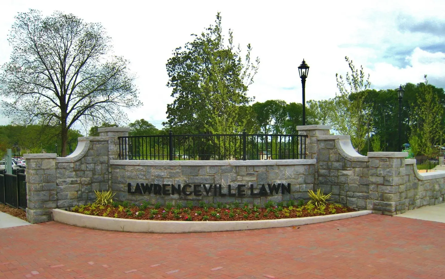 A sign that says lawrenceville lawn