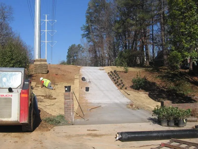 A truck is parked on the side of a road.